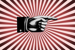 A vintage print of a pointing hand in front of a star pattern